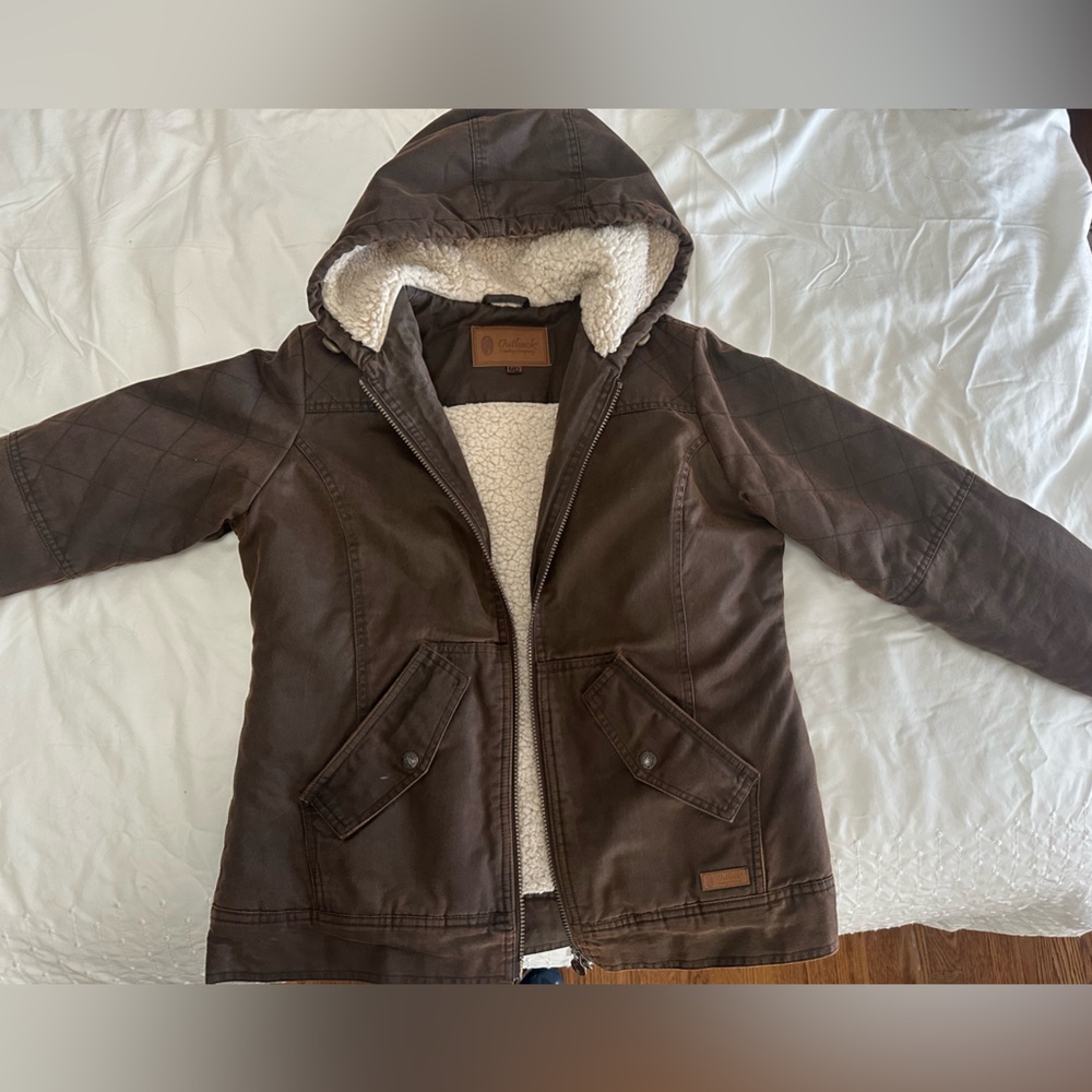 Brown leather Outback Trading Co waterproof lined Heidi Canyonland jacket.